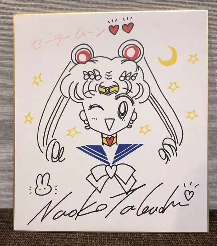 Educational counterfeit reference image (GBQ0YjgW4AARz8u). — educational counterfeit (FAKE) shikishi reference associated with Naoko Takeuchi